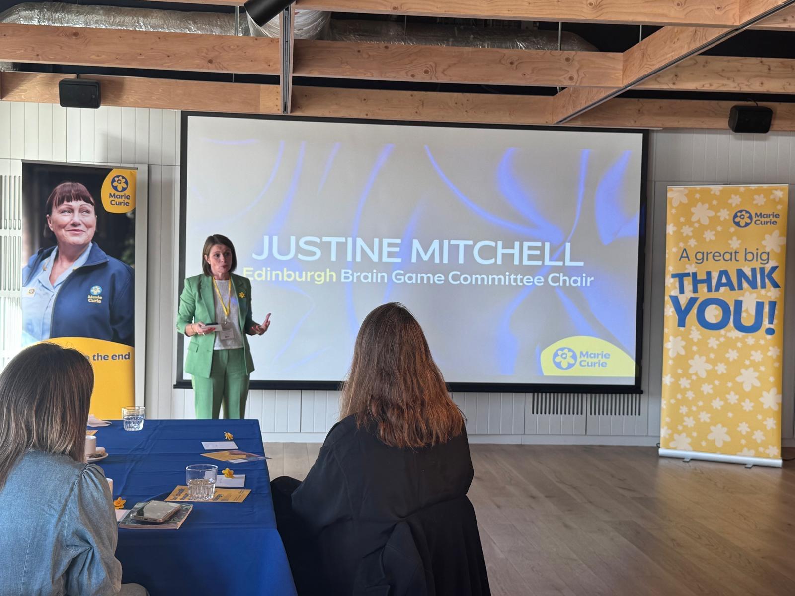 Justine Mitchell speaking at a Marie Curie Edinburgh Brain Game event